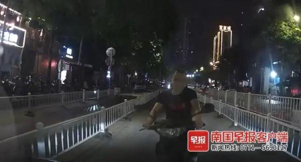 什么情况?南宁一电动车驾驶员逆行撞上小车,竟自扇耳光